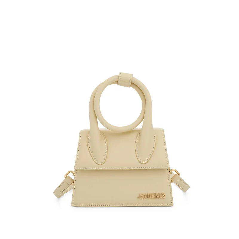 Linen Bucket Bag in Natural Beige with Braided Strap for a Rustic Summer EnsembleLe Chiquito Noeud Leather Bag in Ivory Linen Bucket Bag in Natural Beige with Braided Strap for a Rustic Summer EnsembleLe Chiquito Noeud Leather Bag in Ivory